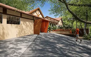 Continuidade da fachada. Foco na entrada principal com pórtico angular em cor laranja ao centro.